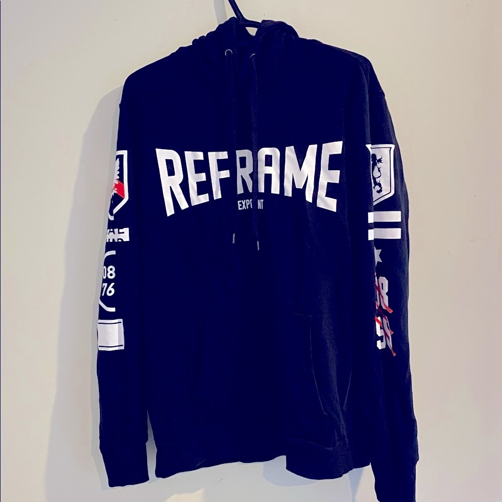 Black “REFRAME” graphic hoodie